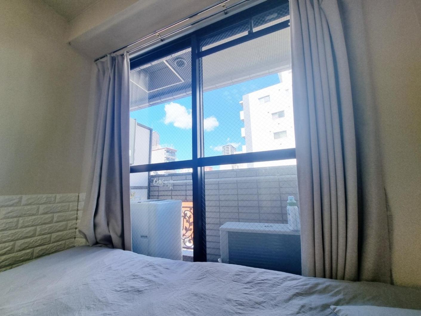 오사카 네코하우스 난바점 Apartment Bagian luar foto